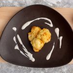 Сырная отбивная, запеченная под сырным соусом